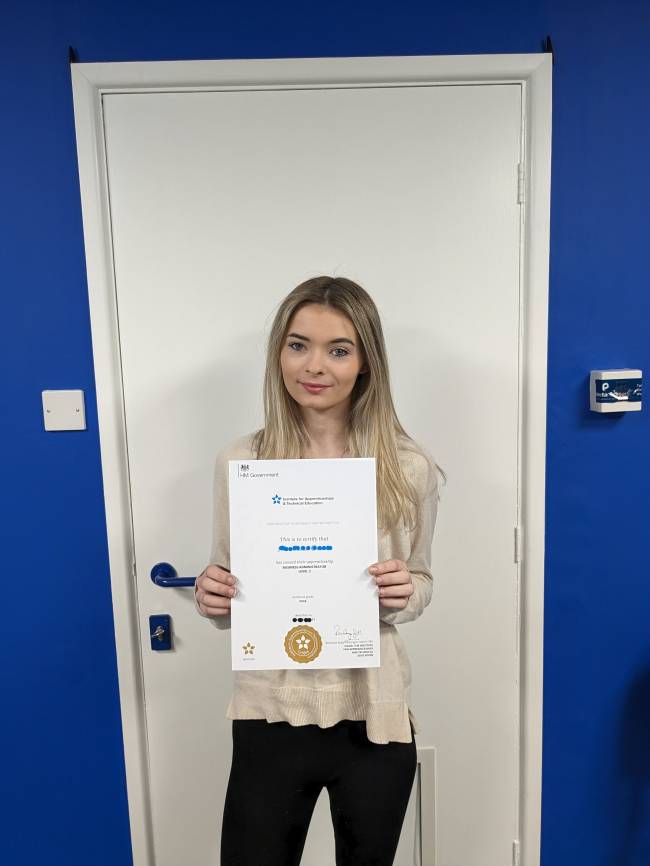 Congratulating Ryleigh Slinn for passing her NVQ Level 3 in Business Administration